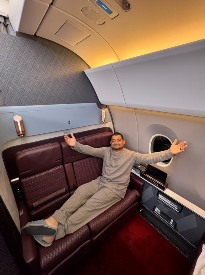 Miguel in a first class suite booked with points